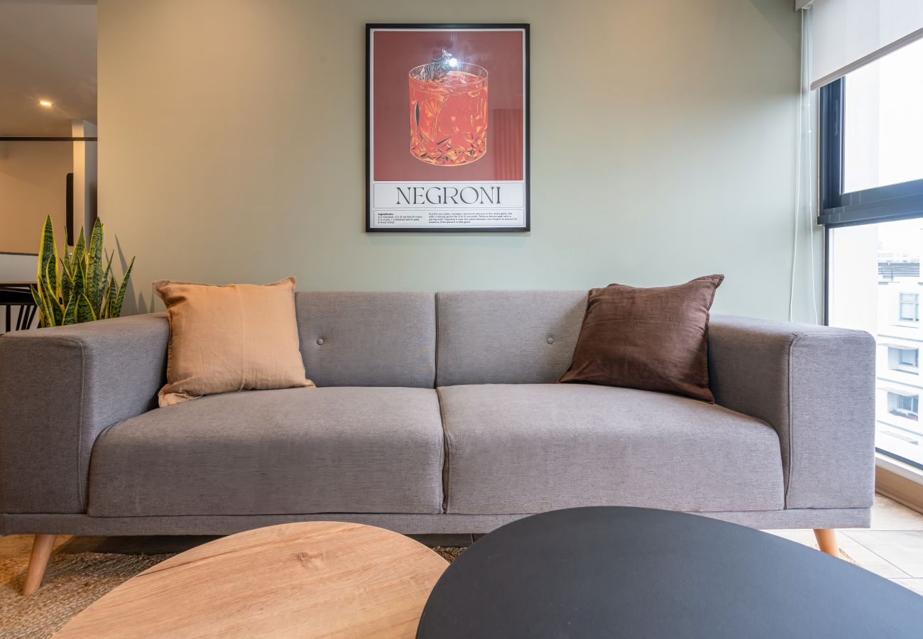 Sala del apartamento Negroni Geko en San Isidro